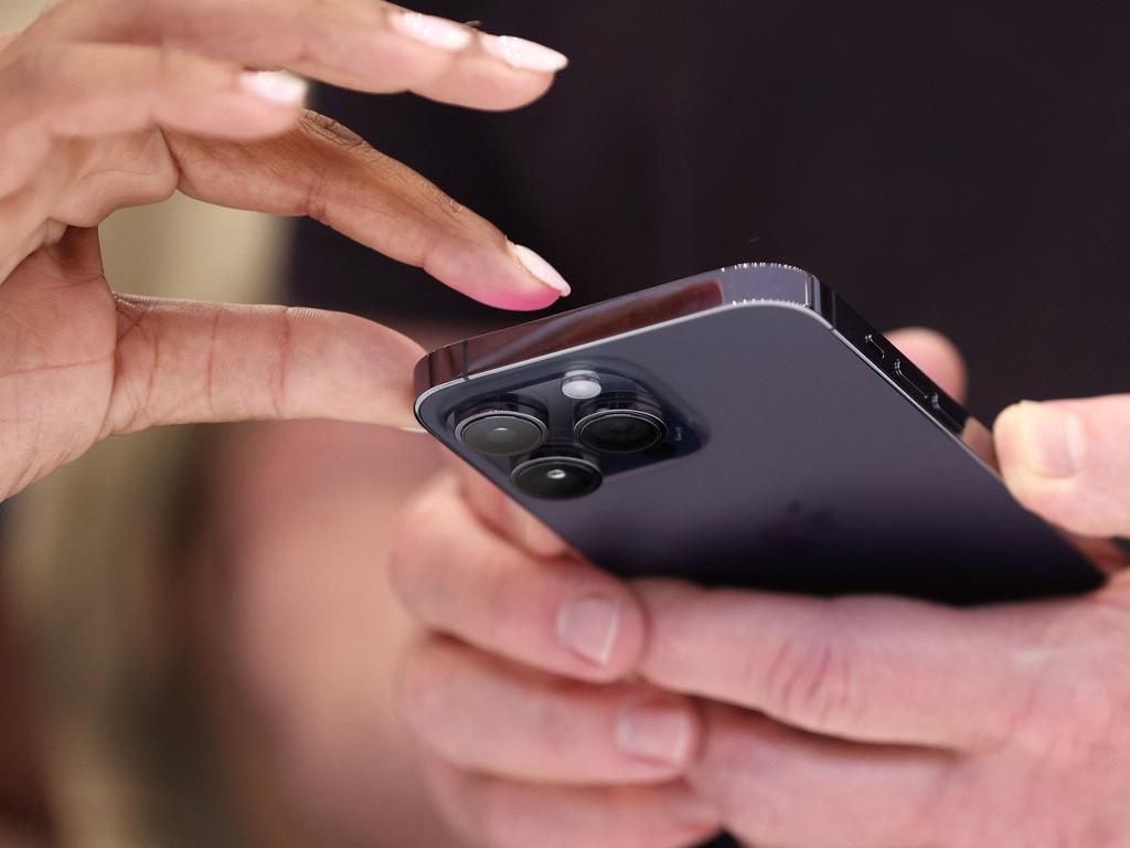 iPhone users can generate randomised emails which forward to email account of their choosing which is linked to their Apple account. Picture: Justin Sullivan/Getty Images/AFP