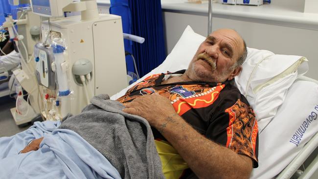 Bevan Gosling had to brave roaring flood waters, a severed highway and a railway line covered in snakes to receive his life-saving treatment in Townsville.