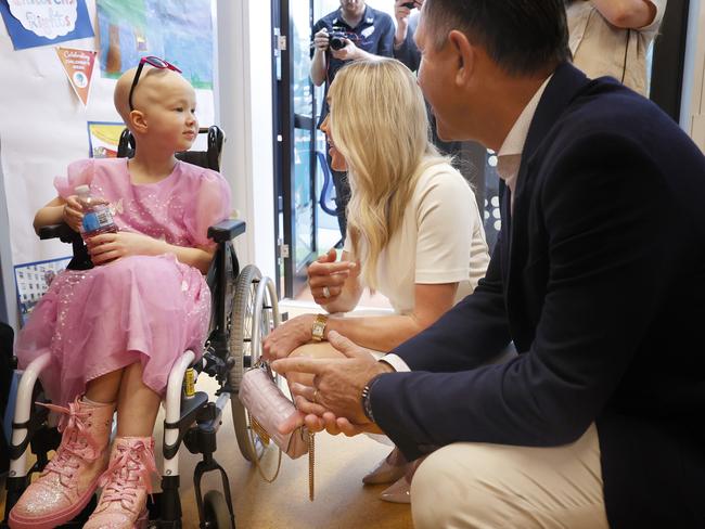 Oncology patient Mia Bramich 8 with Rianna and Ricky Ponting.  Ricky Ponting and wife Rianna visit the Royal Hobart Hospital in relation to the Ponting Foundation partnership.  Picture: Nikki Davis-Jones