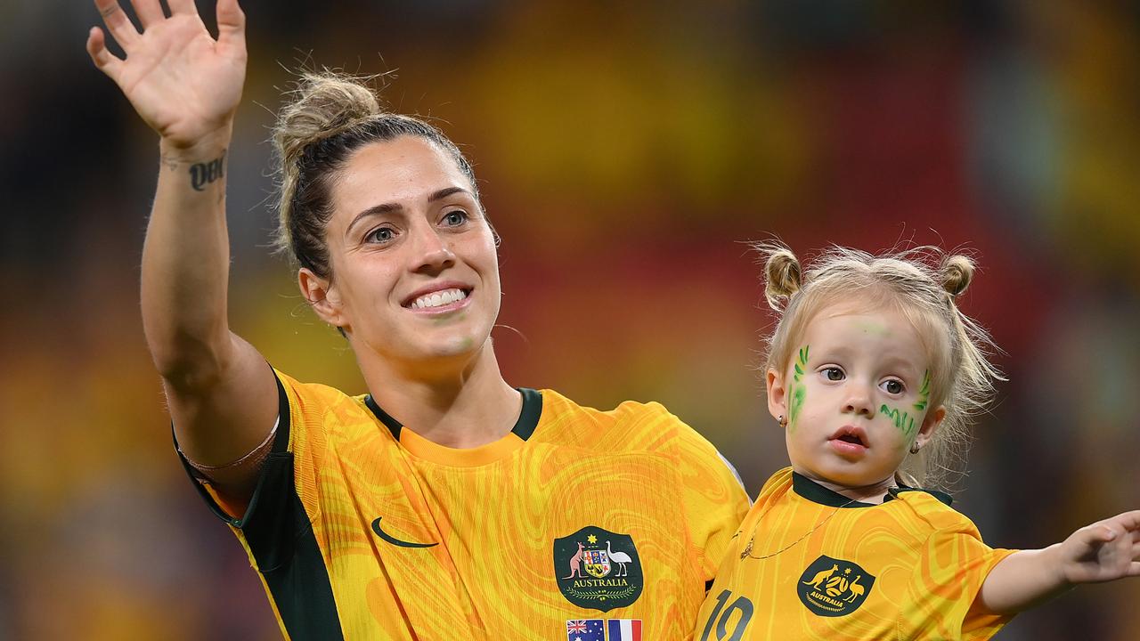 Katrina Gorry and Harper at the World Cup. (Photo by Justin Setterfield/Getty Images)