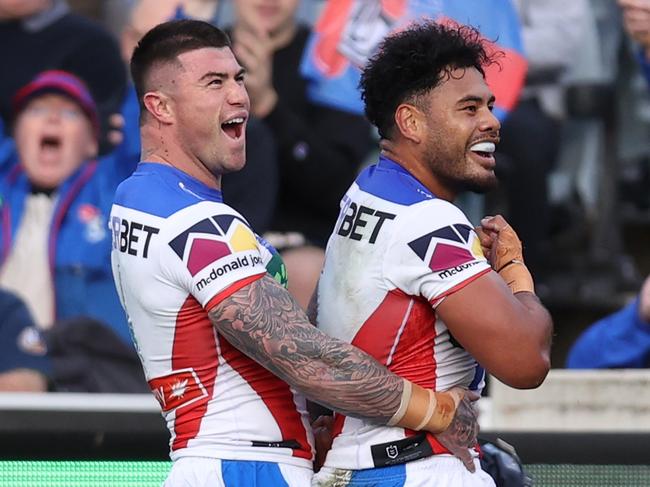 CANBERRA, AUSTRALIA - JULY 07: Greg Marzhew of the Knights celebrates scoring a try with Bradman Best of the Knights during the round 18 NRL match between Canberra Raiders and Newcastle Knights at GIO Stadium on July 07, 2024 in Canberra, Australia. (Photo by Jason McCawley/Getty Images)