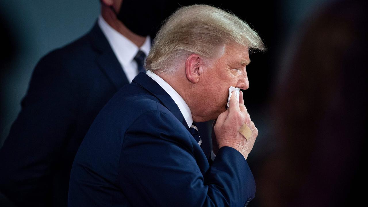 Mr Trump said he’s no longer experiencing any COVID-19 symptoms. Picture: Brendan Smialowski/AFP