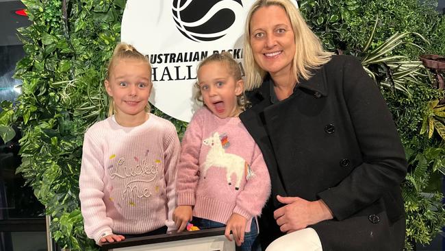 Hall of Fame Inductee Suzy Batkovic with twins Charli Ryder (left) and Layla Ryder.