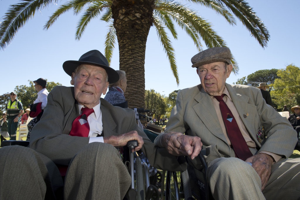 25th Battalion Milne Bay veterans Bert Miles (left) and Kev Olsen after leading the Anzac Day march to the morning commemoration service at Mothers' Memorial, Saturday, April 25, 2015. Photo Kevin Farmer / The Chronicle. Picture: Kevin Farmer