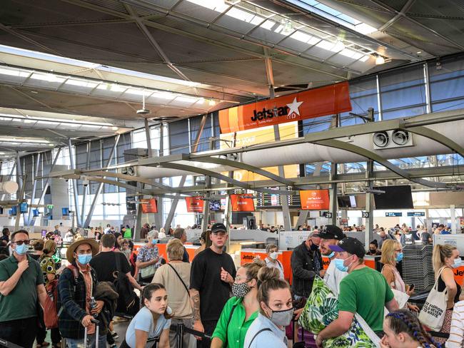 SYDNEY, AUSTRALIA - NewsWire Photos April 11, 2021: People queuing to check in for flights at Sydney Domestic Airport. Picture: NCA NewsWire / James Gourley