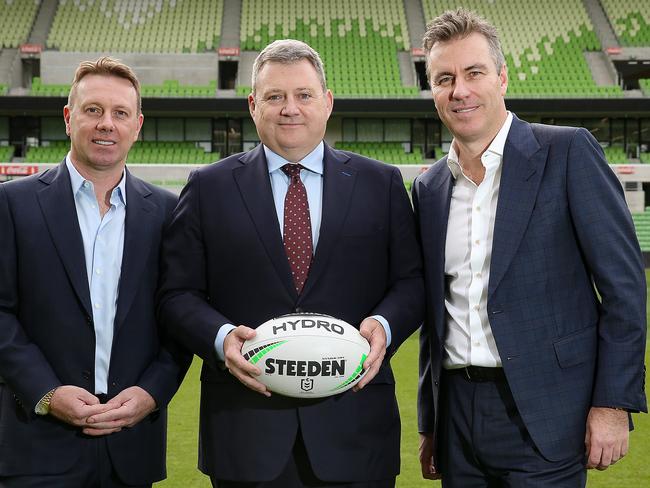 NRL. Melbourne Storm exiting chairman Bart Campbell hands the reigns over to new chairman Matt Tripp, with Tom Carroll at left of picture.This picture is for Melbourne Storm. Picture : Ian Currie