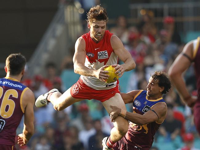 Dane Rampe flies for a mark above Callum Ah Chee. Picture: Phil Hillyard