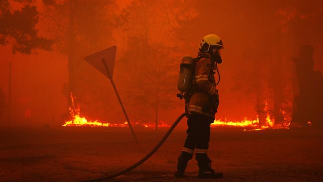 Balmoral burns in south western Sydney as bushfires destroy homes in the area on Saturday. Picture: Sam Ruttyn