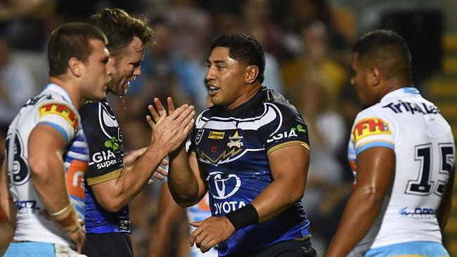 Jason Taumalolo celebrates after scoring a try. Picture: Ian Hitchcock/Getty Images