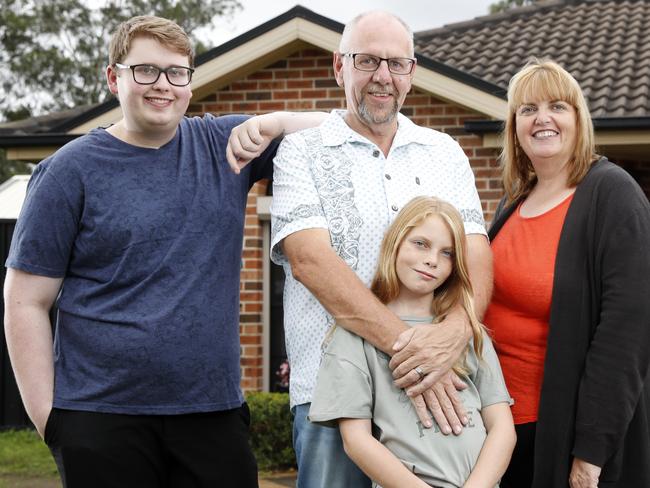 Katrina and Craig Costello with their children Joshua Wearne, 22, and Sophie Wearne, 9, the family recently sold their Cranebrook house mere hours after it hit the market and are moving to the Blue Mountains for a tree change. Picture: Jonathan Ng