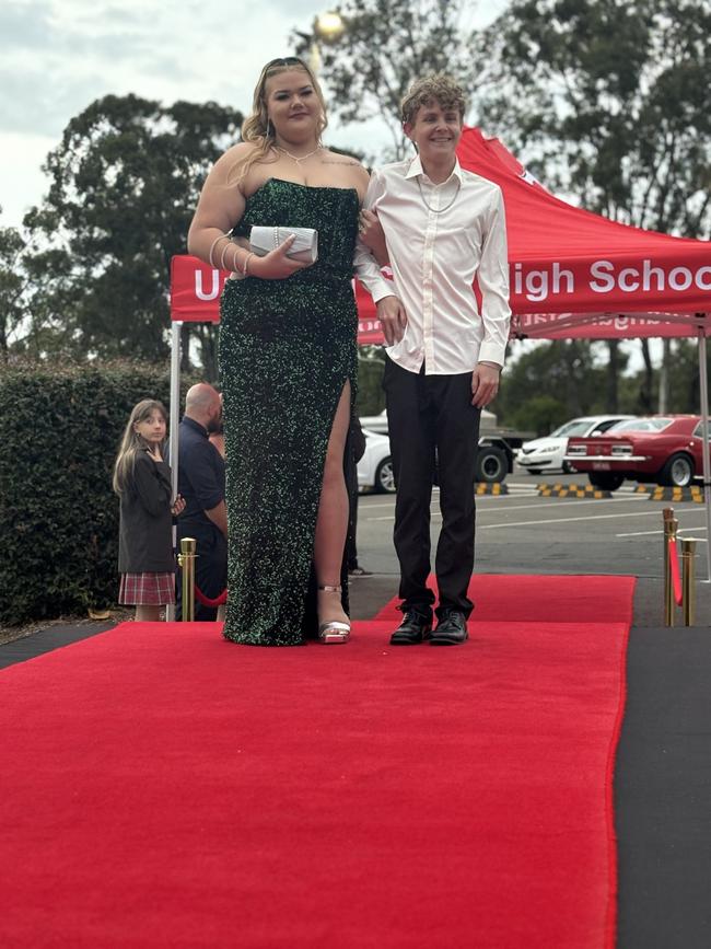 Students from Urangan State High School arrive at their formal.