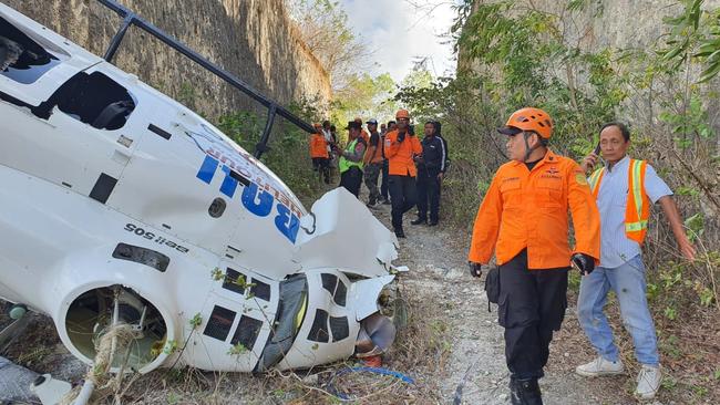 The crashed helicopter in the South Kuta region of Bali in Indonesia. Picture: Indonesian Search &amp; Rescue Agency