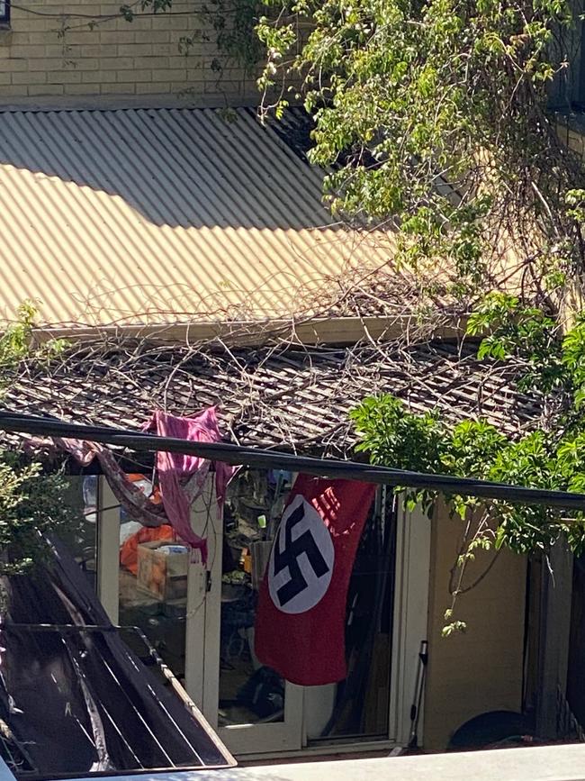 A Nazi swastika flag flies in the backyard of a Newtown home. Picture: Supplied