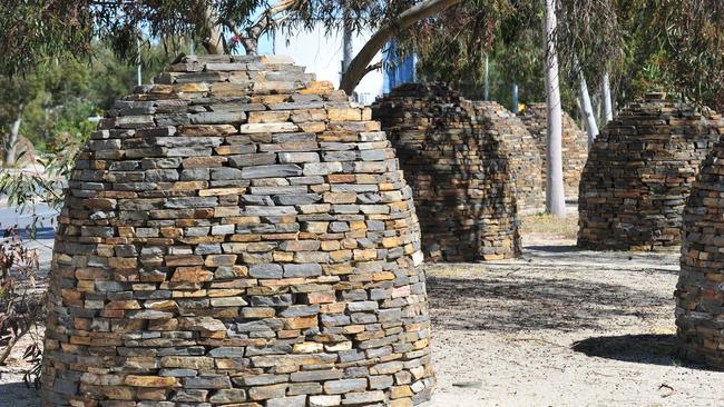 Aleks Danko and Jude Walton's ''Lie of the Land'' sculpture on Sir Donald Bradman Drive.