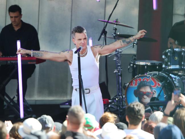 Entertainer Robbie Williams on stage at Federation Square during his free Melbourne concert Picture: NewsWire/ David Crosling