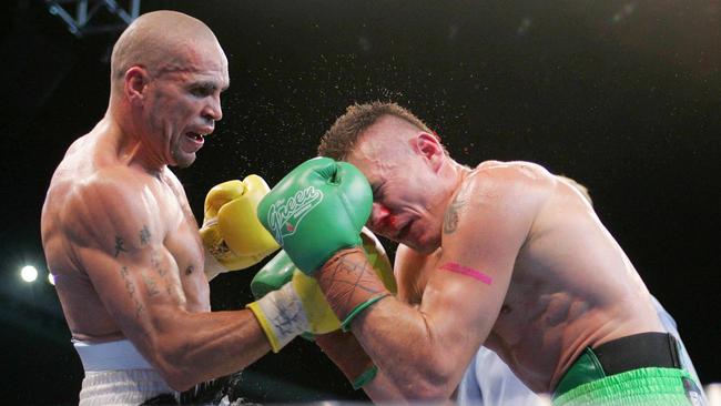 Anthony Mundine lands a shot on Danny Green in their 2006 bout. Picture: Brett Costello