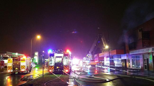 Shop at Newcastle West, Parry Street, went up in flames Monday July 27. Credit: NSW Fire and Rescue