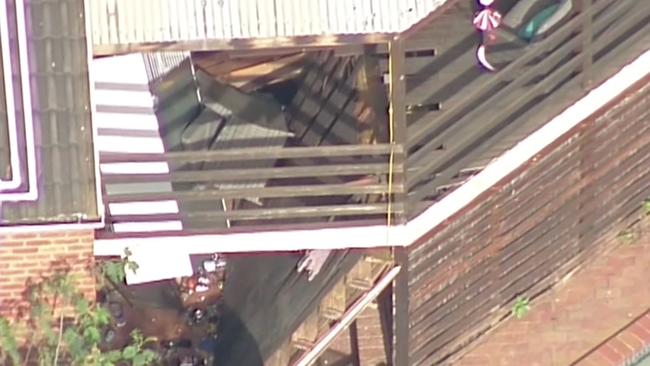 The old, decaying balcony collapsed while the group posed for a photo. Picture: Seven News.