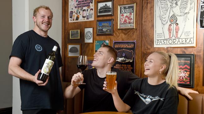 Jack Booker, pictured with Jamie Huffam and Isabelle Lewis, welcomed the dining voucher scheme. Picture: Naomi Jellicoe