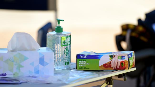 Pre poll voting in Townsville for the Council election. Anti-bacterial wipes on every table