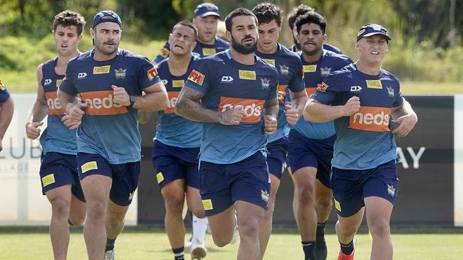 Nathan Peats, centre, trains with the Titans on Saturday after having a flu shot the previous day. Picture: AAP