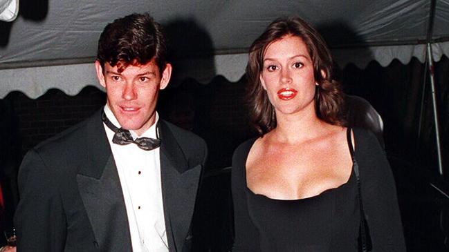 Malkah, then known as Kate Fisher, with her fiance James Packer in 1996.