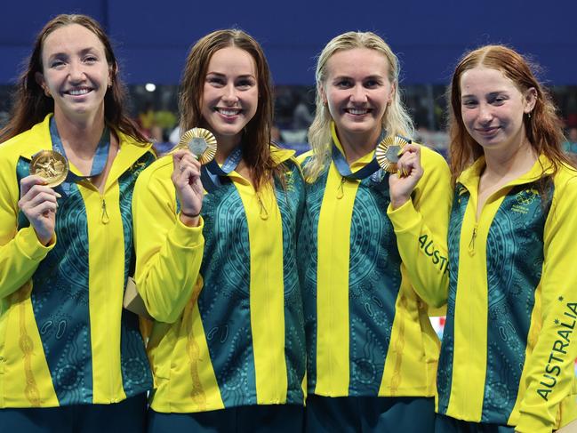 NANTERRE, FRANCE - AUGUST 01: Gold medalists Lani Pallister, Brianna Throssell, Ariarne Titmus and Mollie O'Callaghan of Team Australia pose during the Swimming medal ceremony after the Women's 4x200m Freestyle Relay Final on day six of the Olympic Games Paris 2024 at Paris La Defense Arena on August 01, 2024 in Nanterre, France. (Photo by Xavier Laine/Getty Images)