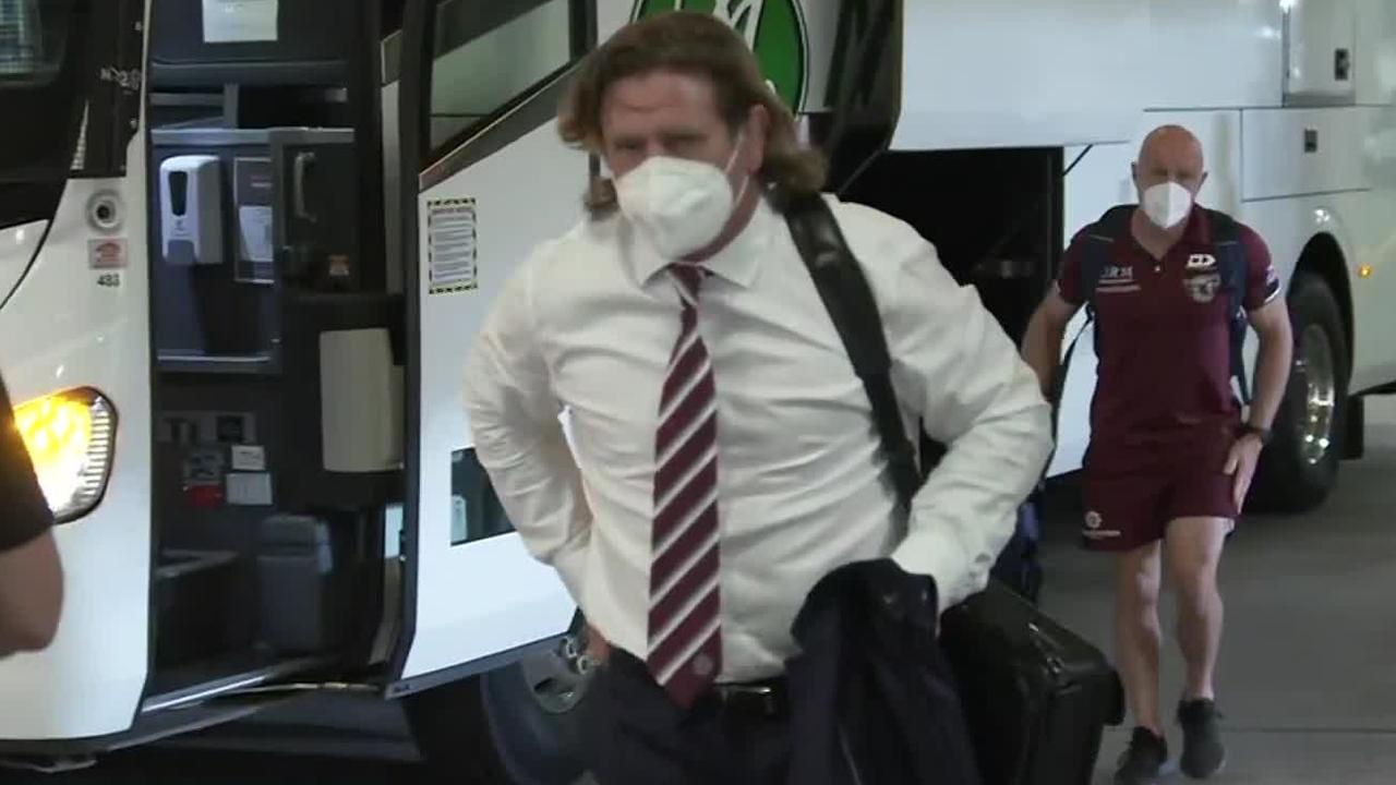 Des Hasler arrives late after the bus was delayed.