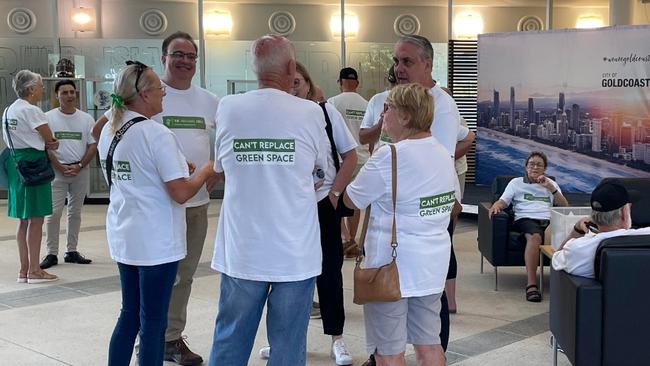 Residents arriving at the Gold Coast City Council protesting against residential development planned for the Arundel Country Club.