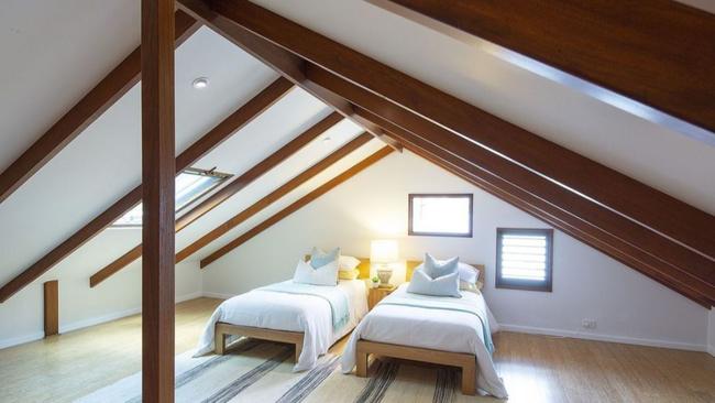 For visitors, an expansive guest wing awaits with two private bedrooms and an attic that is used as the third bedroom.