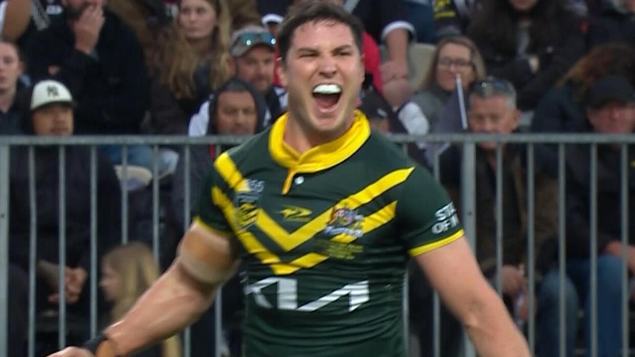 Mitchell Moses scores a try for Australia.