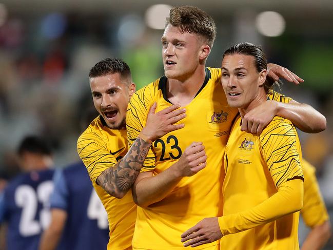 CANBERRA, AUSTRALIA - OCTOBER 10: Harry Souttar of the Socceroos celebrates scoring a goal with team mates during the FIFA World Cup Qatar 2022 and AFC Asian Cup China 2023 Preliminary Joint Qualification Round 2 match between the Australian Socceroos and Nepal at GIO Stadium on October 10, 2019 in Canberra, Australia. (Photo by Mark Metcalfe/Getty Images)