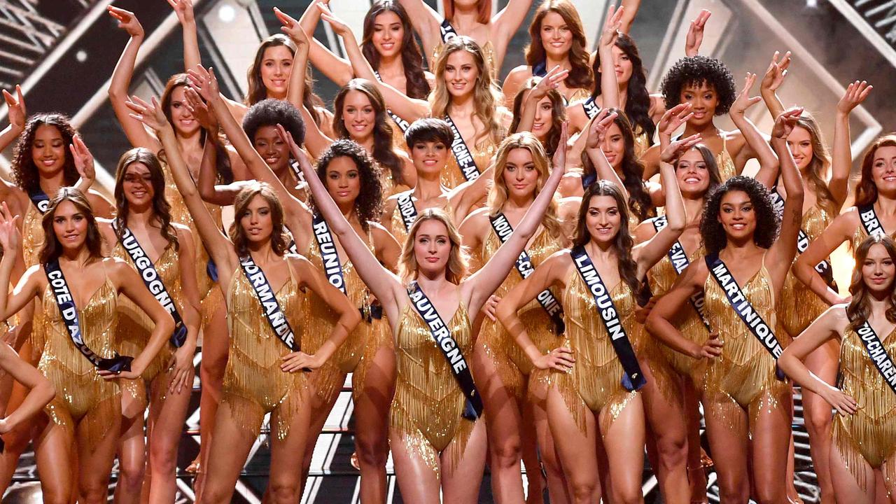 Contestants perform on stage during the Miss France 2024 beauty pageant in Dijon on December 16, 2023. The winner, Eva Gilles, is in the centre of the image. (Photo by ARNAUD FINISTRE / AFP)