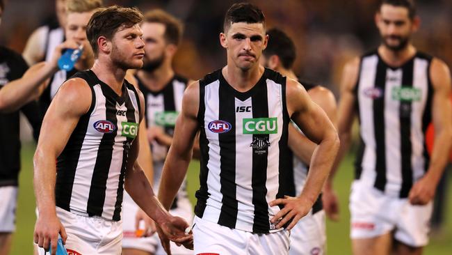 Collingwood skipper Scott Pendlebury leads his defeated team off the MCG after his 250th game. Picture: Michael Klein