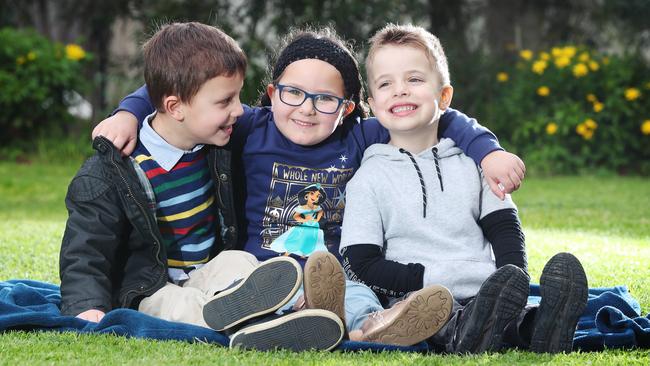 Their families became very close when they all spent months at the Royal Children's Hospital waiting for a transplant — and then the years since coping with the recovery. Picture: Rebecca Michael