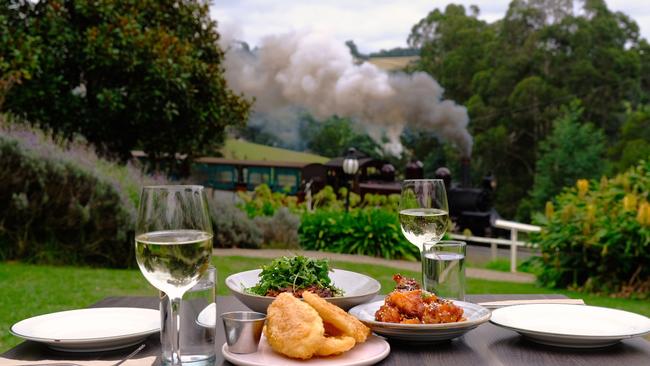 Puffing Billy heads past at the Paradise Valley Hotel.