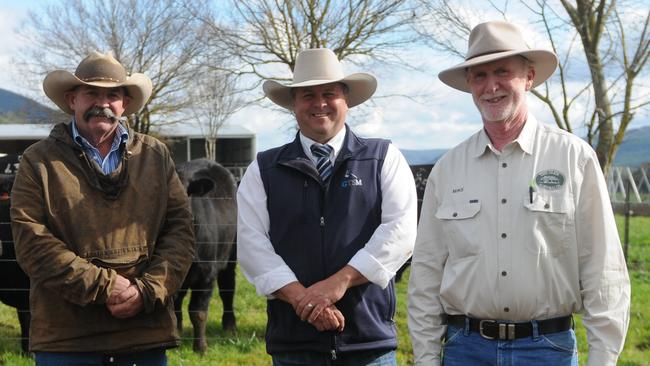 Recently retired stud stock agent and auctioneer Michael Glasser, centre, pictured with Greg White and Michael Gadd at a bull sale at The Glen.