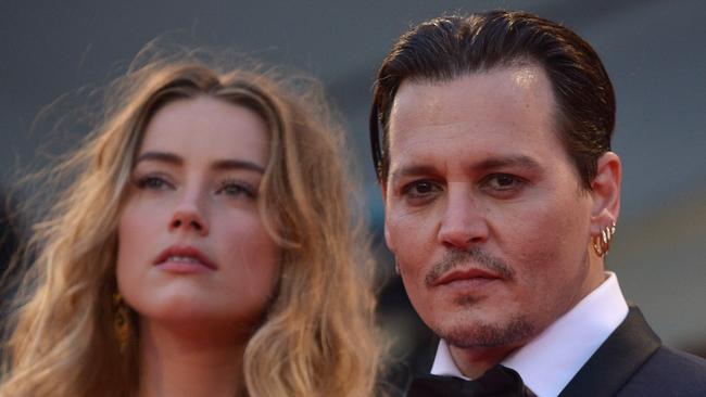 Amber Heard nad Johnny Depp in happier days in 2015. Picture: AFP