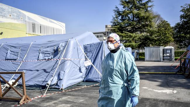 Medical staff are facing physical and emotional stress. Picture: AP/Claudio Furlan/LaPresse