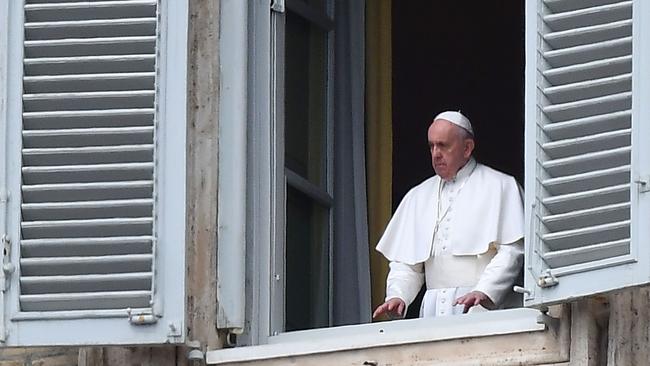 Pope Francis appears at the window of the Apostolic palace in the Vatican. Picture: AFP.