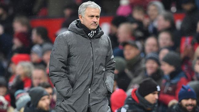 Manchester United's Portuguese manager Jose Mourinho leaves the pitch at the end of the English Premier League football match between Manchester United and Huddersfield Town at Old Trafford in Manchester, north west England, on February 3, 2018. / AFP PHOTO / Paul ELLIS / RESTRICTED TO EDITORIAL USE. No use with unauthorized audio, video, data, fixture lists, club/league logos or 'live' services. Online in-match use limited to 75 images, no video emulation. No use in betting, games or single club/league/player publications.  /