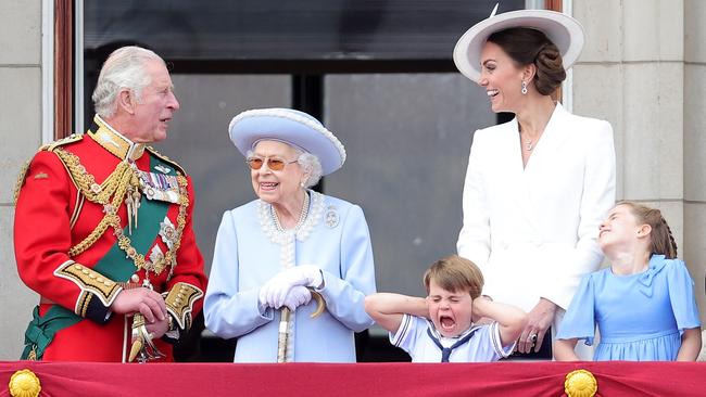 Queen Elizabeth II smiles on the balcony of Buckingham Palace during Trooping the Colour alongside (L-R) Prince Charles, Prince of Wales, Prince Louis of Cambridge, Catherine, Duchess of Cambridge and Princess Charlotte of Cambridge.