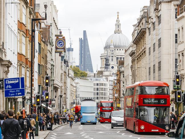 Busy street in City of London with heavy traffic, crowds of people and dome St. Paul's CathedralEscape 27 August 2023Kendall HillPhoto - Getty Images