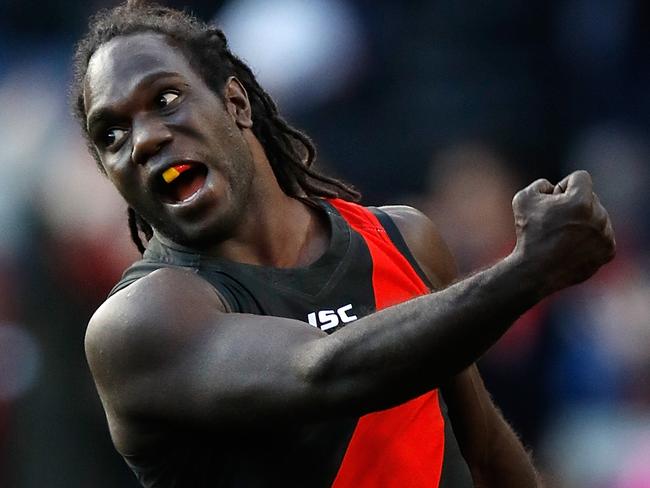MELBOURNE, AUSTRALIA - AUGUST 05: Anthony McDonald-Tipungwuti of the Bombers celebrates a goal during the 2017 AFL round 20 match between the Essendon Bombers and the Carlton Blues at the Melbourne Cricket Ground on August 05, 2017 in Melbourne, Australia. (Photo by Michael Willson/AFL Media/Getty Images)