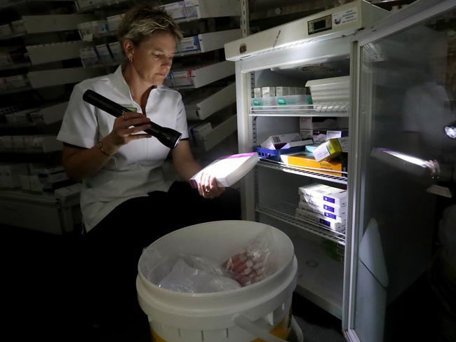 Pharmacist Kirrily Chambers had to throw out medicine at the Green Dispensary Pharmacy in the Adelaide Hills after a power black out due to a large storm in December. Picture: Kelly Barnes/The Australian