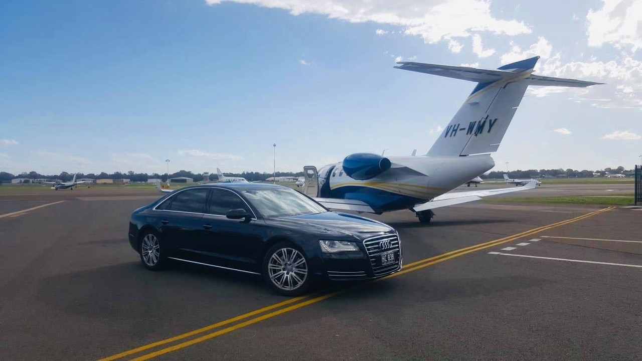 A Brunel driver picking up a customer who has just stepped off a private jet