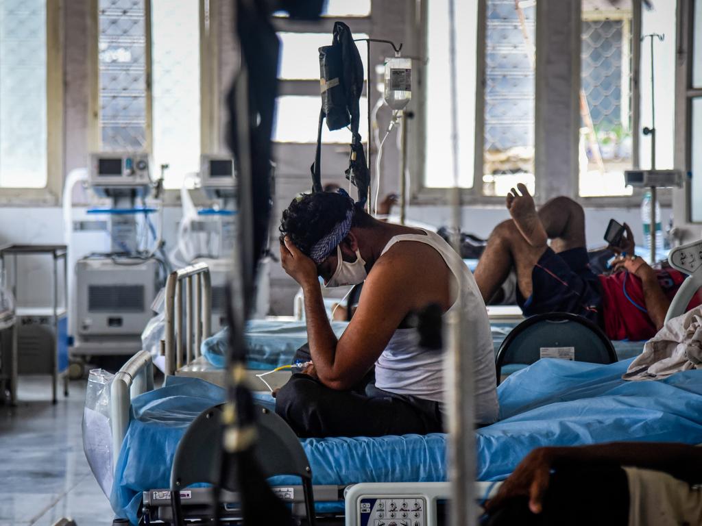 A patient who has Covid-19 sits on his bed in an ICU ward at the government-run St. George hospital on May 27, 2021 in Mumbai, India. Picure: Fariha Farooqui/Getty Images