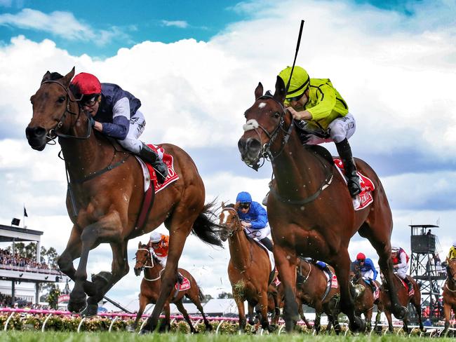 Almandin ridden by Kerrin McEvoy and Heartbreak City ridden by João Moreira at the Melbourne Cup. Picture: George Salpigtidis