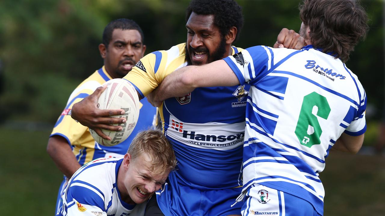 Kangaroos' Bradley Stephen pushes through the Brothers defence in the Cairns District Rugby League (CDRL) match between Cairns Brothers and Cairns Kangaroos, held at Stan Williams Park, Manunda. PICTURE: BRENDAN RADKE