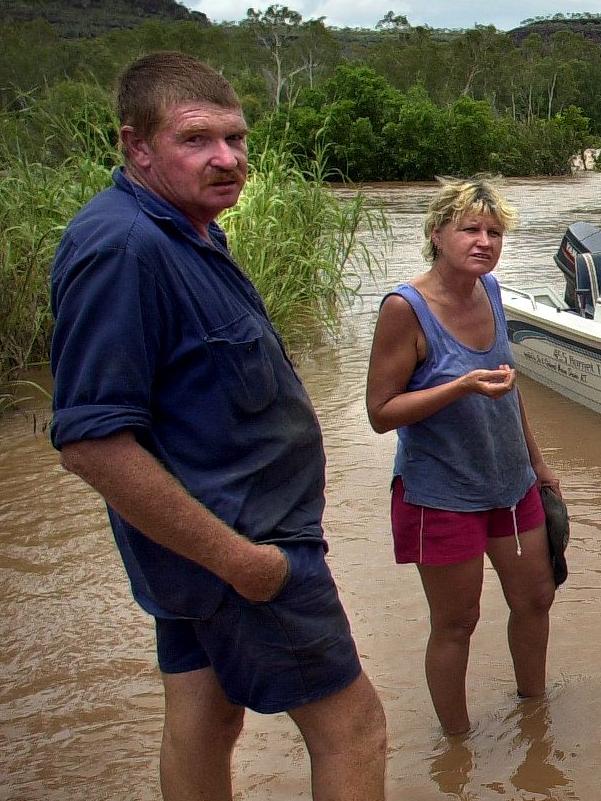 Crocodile farmers Bluey and Janelle Pugh depicted in 2003 during a flooding emergency at Victoria River. Picture: File